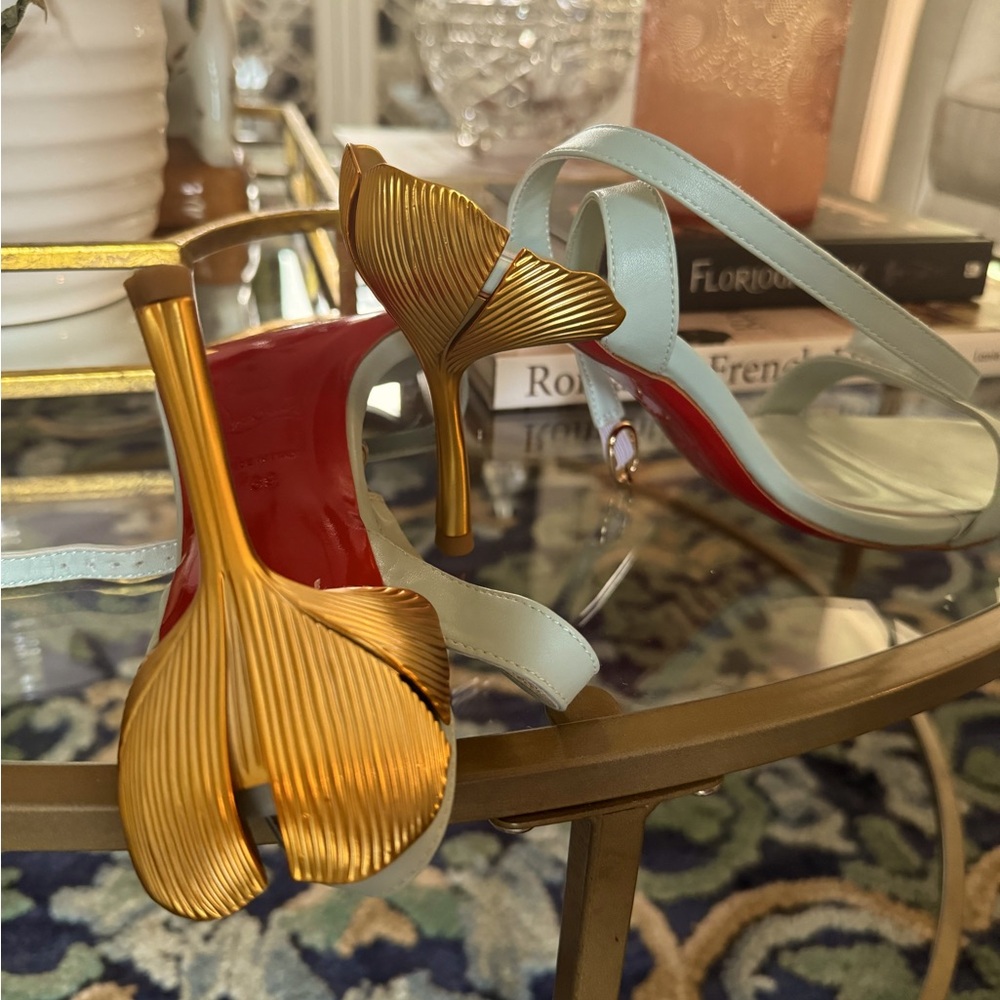 Louboutin flower heel sandals size 39 runs around an 8.5